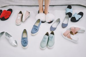 Woman trying on comfy house shoes
